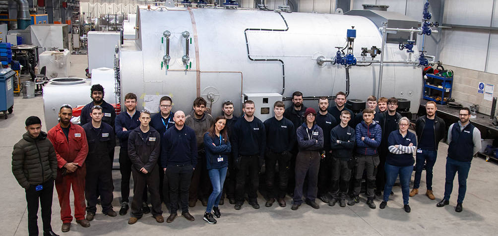 Our current and past apprentices pose for a photo for National Apprenticeship week 